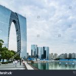 stock-photo-suzhou-china-aug-the-east-gate-of-suzhou-new-cbd-landmark-building-705595093